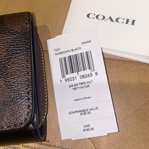 Small Trifold Wallet In Signature Canvas - Picture 4 of 4